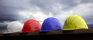 safety-hard-hats-on-grey-sky-background-3d-illust-2021-08-28-14-50-18-utc – Synergos Consultancy
